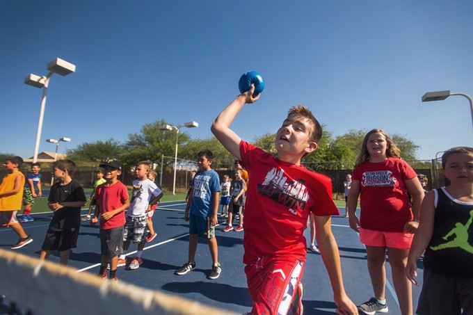 A camper throws a dodge ball at Oro Valley's 2016 summer camp at its community center. The town has camps planned this year, but the possible continuance of Gov. Ducey's stay-home order has thrown a wrench in the gears. - TUCSON LOCAL MEDIA FILE PHOTO