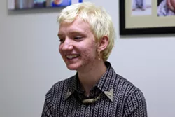 Fran Howard, 17, who identifies as nonbinary gender queer, worries about proposals to make it harder for trans teens to transition. “For a trans person, this isn’t the same as dyeing your hair color. … It’s being yourself,” Howard says. (Photo by Annabella Piunti/Cronkite News)