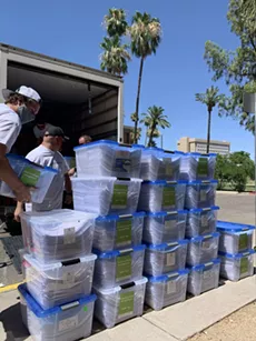 Volunteers for the citizens initiative Smart and Safe Arizona drop of a symbolic 420,000 signatures - ERIC CHALMERS
