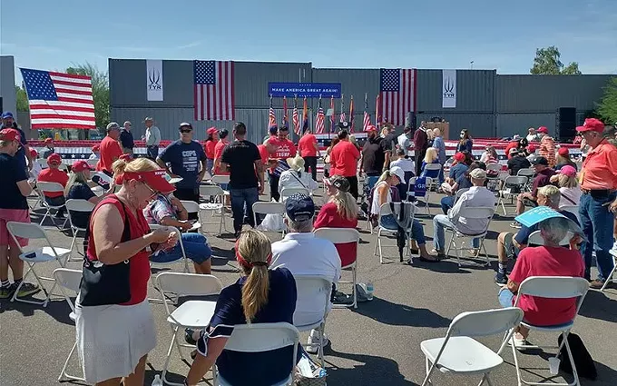 A crowd gathers at TYR Tactical in Peoria in advance of a campaign event by Vice President Mike Pence on Thursday – the same day Democratic challengers Joe Biden and Kamala Harris arrived in the Valley. - POOL PHOTO BY ROB CRILLY/WASHINGTON EXAMINER