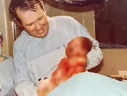 Dr. James Blute III delivered Aaron Salgado in 1983. A DNA test later showed that Blute was Salgado's father.