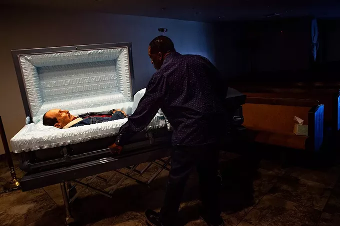 Funeral director Ron Thornson prepares for a service at Peace Chapel Funeral Home in Phoenix. The funeral industry has been one of the hardest hit during the pandemic, but these “last responders” often are among the least recognized for providing essential services. - PHOTOS BY ALBERTO MARIANI/CRONKITE NEWS