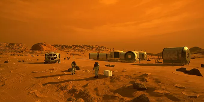 This artist’s concept depicts astronauts and human habitats on Mars. But that’s years off, after several missions to the moon, NASA spokesperson Cheryl Warner says. - NASA