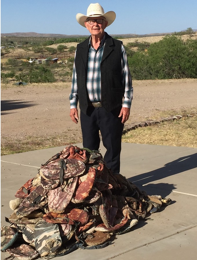 Arivaca rancher Jim Chilton displays a collection of carpet booties found on his ranch. - COURTESY JIM CHILTON