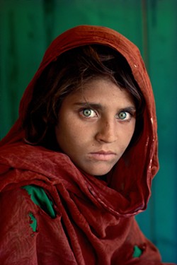 On display at Etherton Gallery: Steve McCurry, Afghan Girl (Sharbat Gula), Peshawar, Pakistan, 1984 Fuji Crystal Archive print, © Steve McCurry/Magnum Photos, courtesy Etherton Gallery