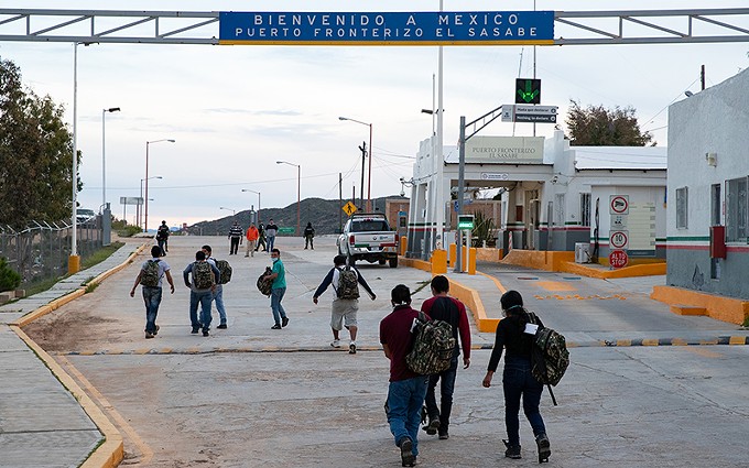 Migrants head back to Mexico after being encountered by Border Patrol agents near Sasabe in March 2020, under COVID-19 policy that Biden administration is keeping from the Trump administration. But the Supreme Court said Biden cannot end Trump administration's "remain in Mexico" policy that automatically turned back asylum seekers. - PHOTO BY JERRY GLASER/CUSTOMS AND BORDER PROTECTION