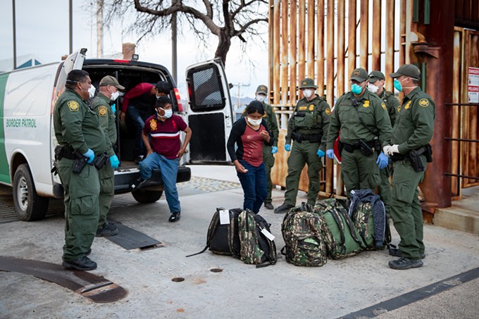 Border Patrol agents used Title 42 to transport migrants found near Sasabe back to the U.S.-Mexico border, in this photo from March 2020, the early days of the order. More than 1.8 million people have since been turned back under Title 42, which the Biden administration wants to end May 23. - PHOTO BY JERRY GLASER/U.S. CUSTOMS AND BORDER PROTECTION