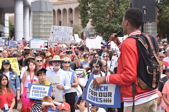 Student speakers talk about the effects of gun violence on their lives as March for Our Lives participants gather on Jacome Plaza, on March 24.