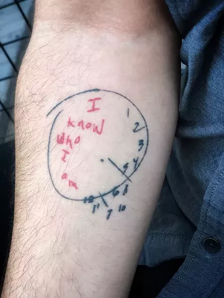 A Cain tat. - BRIAN SMITH