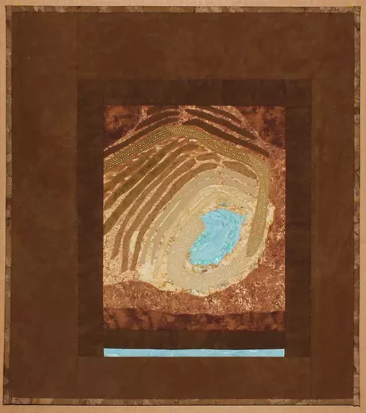 Seen from Above: Open Pit Mine, Sahuarita, AZ,” fabric, sequins and thread by Annie Gordon. - ANNIE GORDON