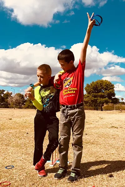 Jayden and Tristan on the day they reunited after being legally separated and adopted by different families. - COURTESY OF BRIAN HATFIELD