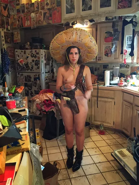 Melanie King in Eric Kroll’s Tucson kitchen. - BRIAN SMITH